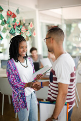 People shaking hands in office