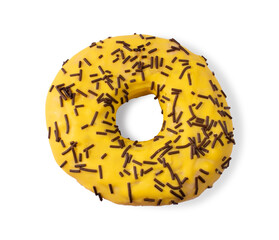 A donut covered with yellow icing and chocolate chips isolated on a white background.Fresh bright pastries on a white background.