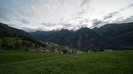 The village of “Grächen” in Valais in Switzerland with its typical houses, after sunset.