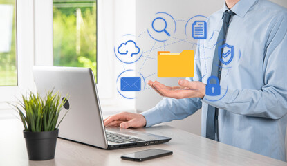 Document Management System DMS .Businessman hold folder and document icon.Software for archiving,...