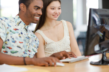 People working on computer in office