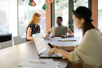 Fototapeta premium People working at conference table in office