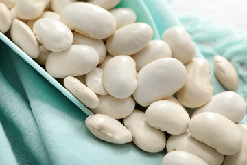 Raw beans on fabric background, closeup