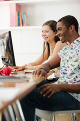 People working on computer in office