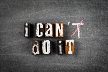 I can do it concept. Letters of the alphabet on a chalk board