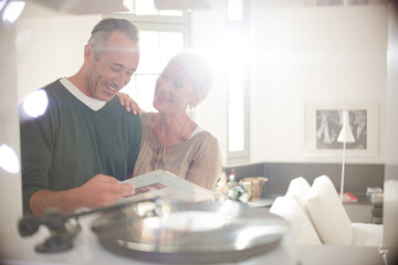 Older couple listening to vinyl records