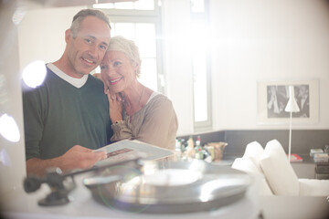 Older couple listening to vinyl records
