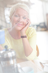 Older woman drinking cup of coffee