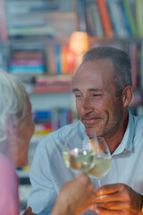 Older man smiling at wife