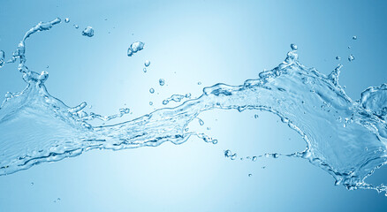Fototapeta na wymiar Water splash isolated on blue background