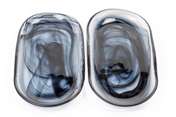 Two empty oblong glass serving plates on a white background