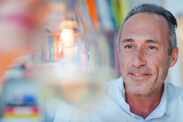 Older man smiling at wife