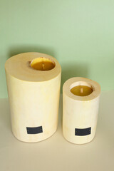 Wooden candle holder rustic interior centerpiece with candles in a cozy barn setting.