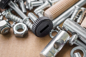 Fototapeta na wymiar Assembly furniture tool kit with screw dowel and bolt