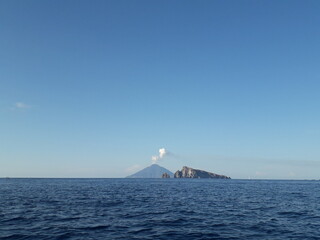 Fototapeta na wymiar Volcano erupting in the middle of the sea. Aeolian islands, Italy