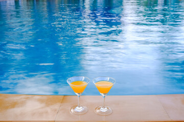 cocktail or mocktail drink near poolside