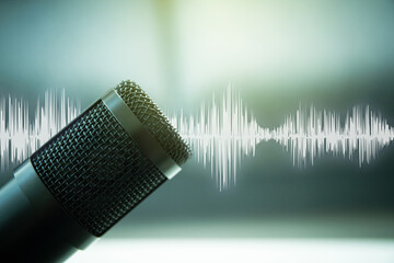 Professional condenser microphone in sound recording studio close up with a beautiful - fantasy...