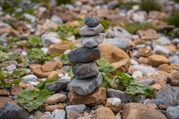 Cairn on the shore of the River Wharfe in Hubberholme, North Yorkshire, England, UK