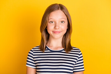 Photo of satisfied school person smile look camera wear striped outfit isolated on yellow color background