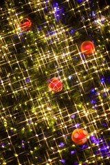 Christmas Tree decorations lit background