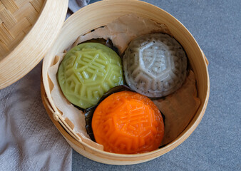 Auspicious Chinese street food snack. Colorful Tortoise Cake aka Ang Ku Kueh. Festive food available all seasons, made from glutinous rice skin wrapped in cooked and sweet fragrant mung bean paste.