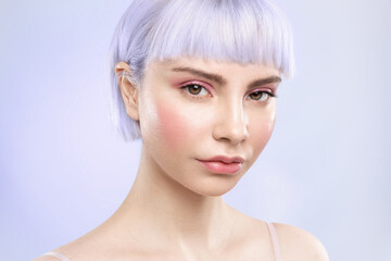 Cool young blond girl with healthy ideal glowing skin,  lavender hair and modern gentle make up,...