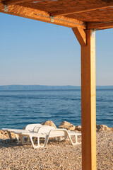 Thatched bungalow on the Croatian seaside.Rest and comfortable summer vacation on the sunny coast.