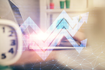 Double exposure of woman hands typing on computer and arrows drawing. Success concept.