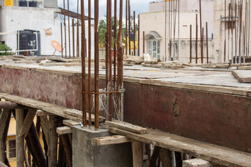 Freshly laid concrete roof in a under construction building.