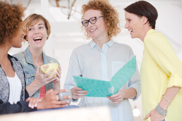 Fototapeta premium Portrait of female colleagues smiling in office