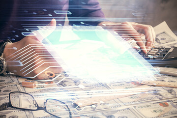 Multi exposure of man's hand holding and using a digital device and data theme drawing. Innovation concept.