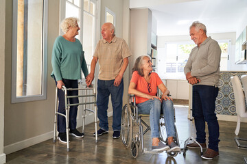 Group of seniors talking in the retirement home