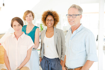 Group portrait of smiling office workers