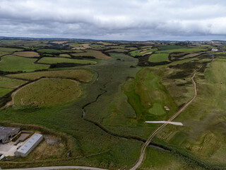 aerial of golf course in cornwall uk 