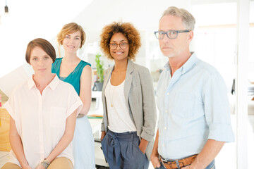 Group portrait of smiling office workers