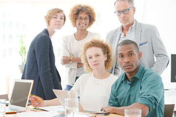 Obraz premium Portrait of office team smiling in conference room