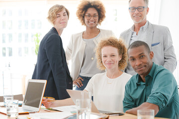 Fototapeta premium Portrait of office team smiling in conference room