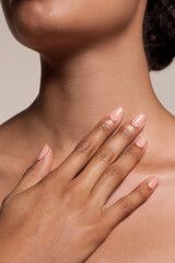 Close-up of woman touching chest