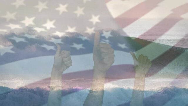 Animation of flag of united states blowing over seascape and hands