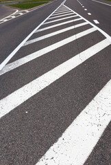 paved road with white road markings for transport management