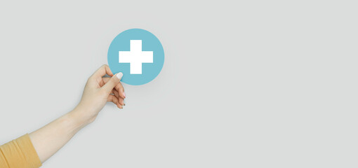 Hand holding blue paper cut with health care icon, Health care and mental health, cleanliness, safety , world mental health day concept	