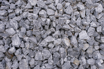 Decorative gray stones with white streaks. Natural stones for design.