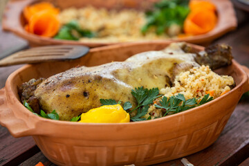 Homemade Roasted Duck with rice and vegetables.Christmas roast duck served on a festive table