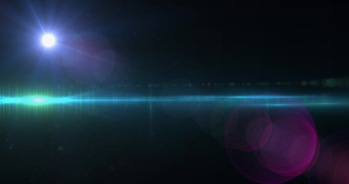 Spot of light and light trail against black background - Powered by Adobe