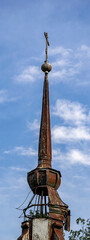 the sharp spire of the Orthodox bell tower