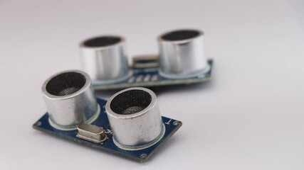 Pair of Ultrasonic ranging module used with arduino controller board to make interesting projects in detail view on rotating table