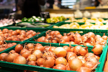 Onions in a basket. vegetables at the market