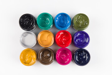 bottle of mixed color paints isolated on white background