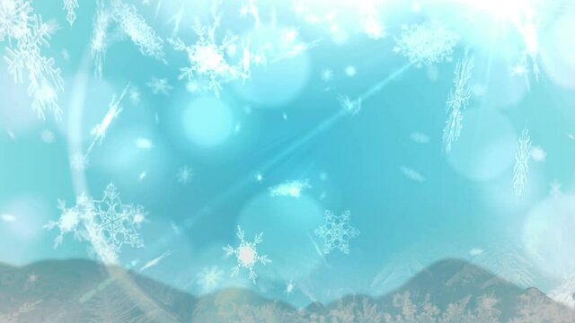 Animation of christmas snow falling over christmas decorations on blue background