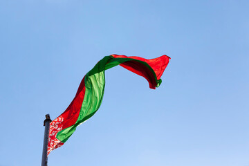 belarusian state flag on a blue sky